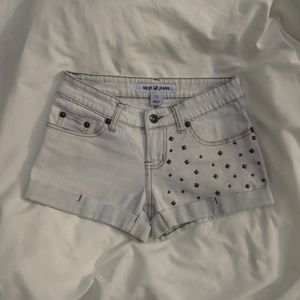 Studded light wash cutoff shorts